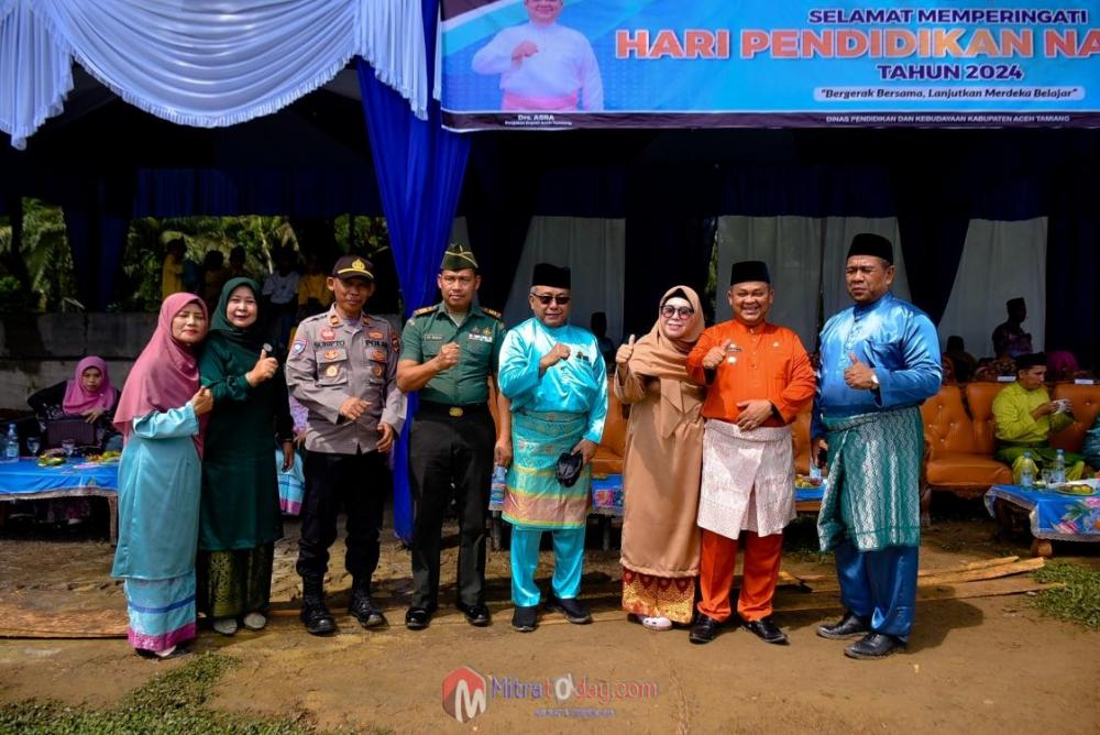 Pimpin Upacara Hardiknas, Pj Bupati Asra Ajak Guru Kokohkan Kembali Pondasi Pendidikan Moral di Sekolah